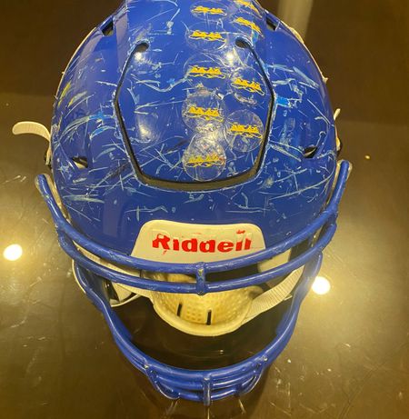 Scratched up football helmet